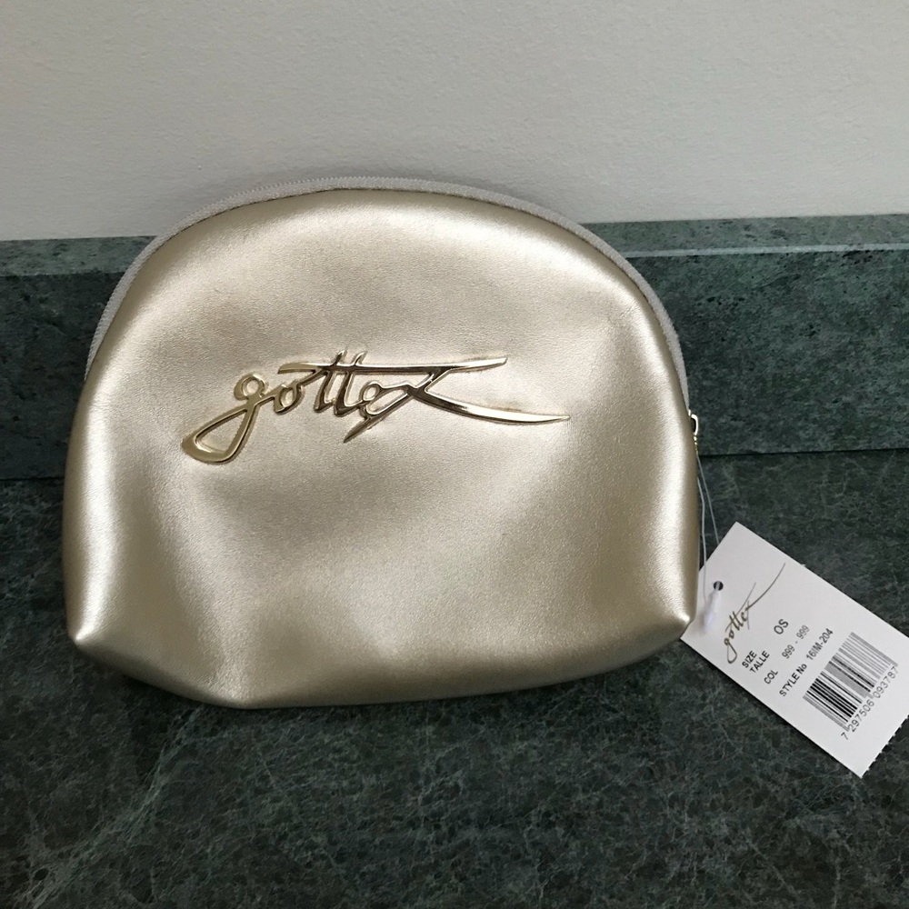 NWT. Gottex gold makeup bag